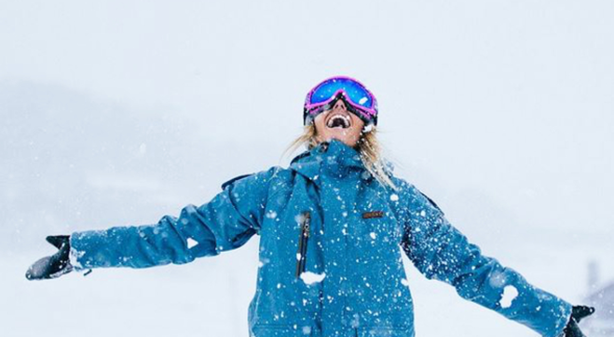 Tourist having fun in the snow