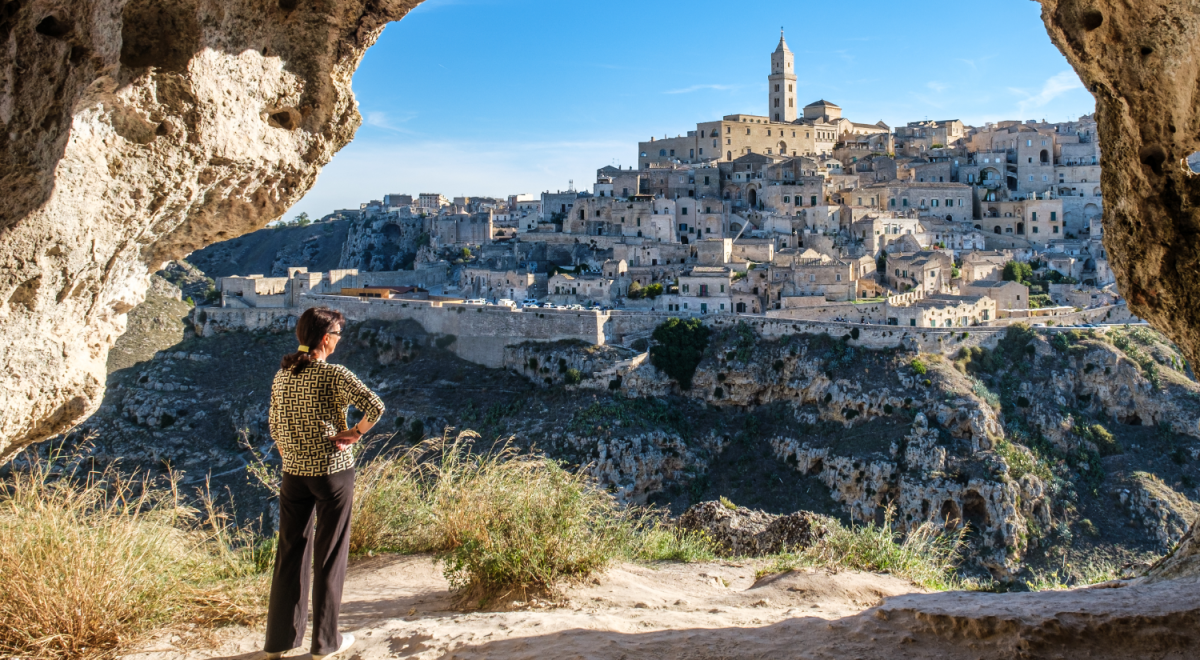 Woman looking out at the city of Matera