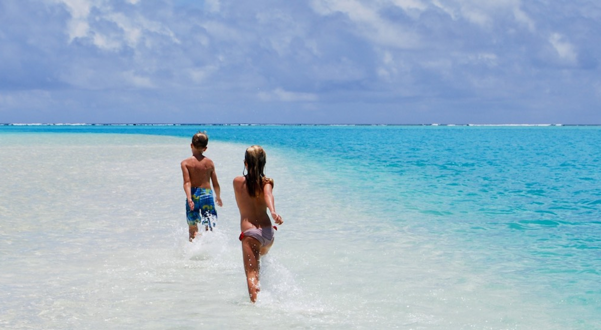 Kids playing in shallow water 