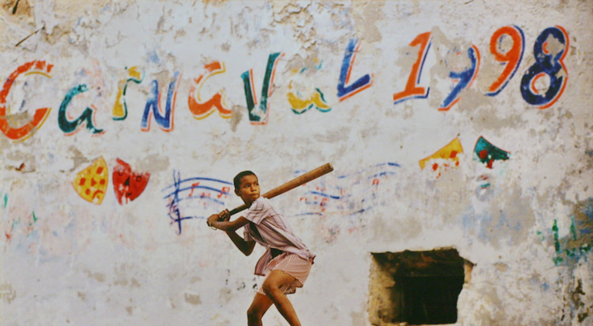 Mural of boy playing baseball in Cuba