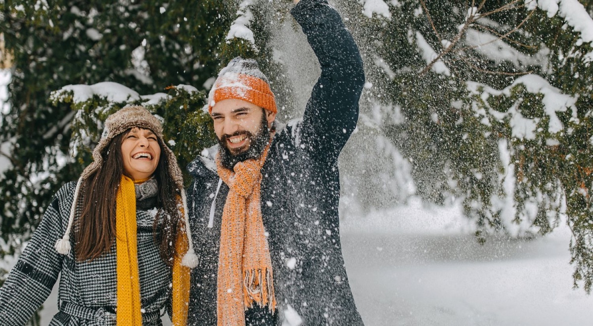 Couple playing in the snow