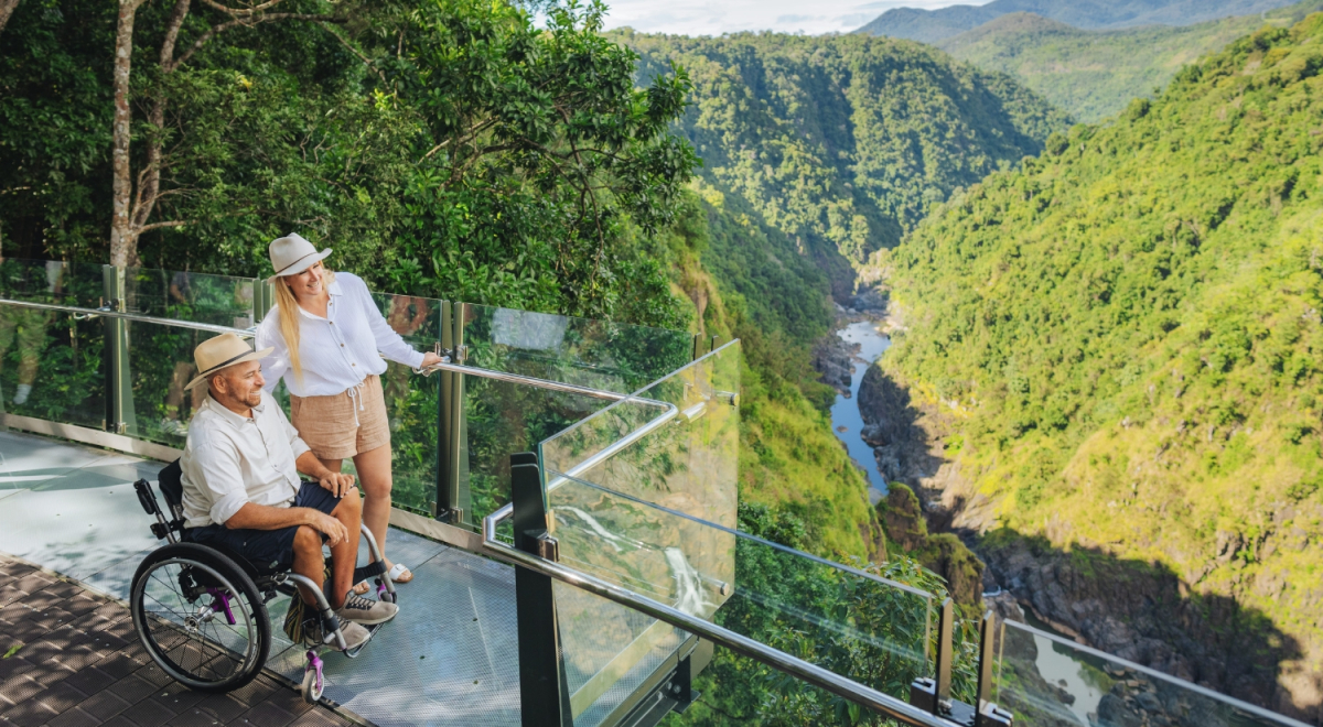 Couple taking in the views from The Edge Lookout on the Skyrail Rainforest Cableway route