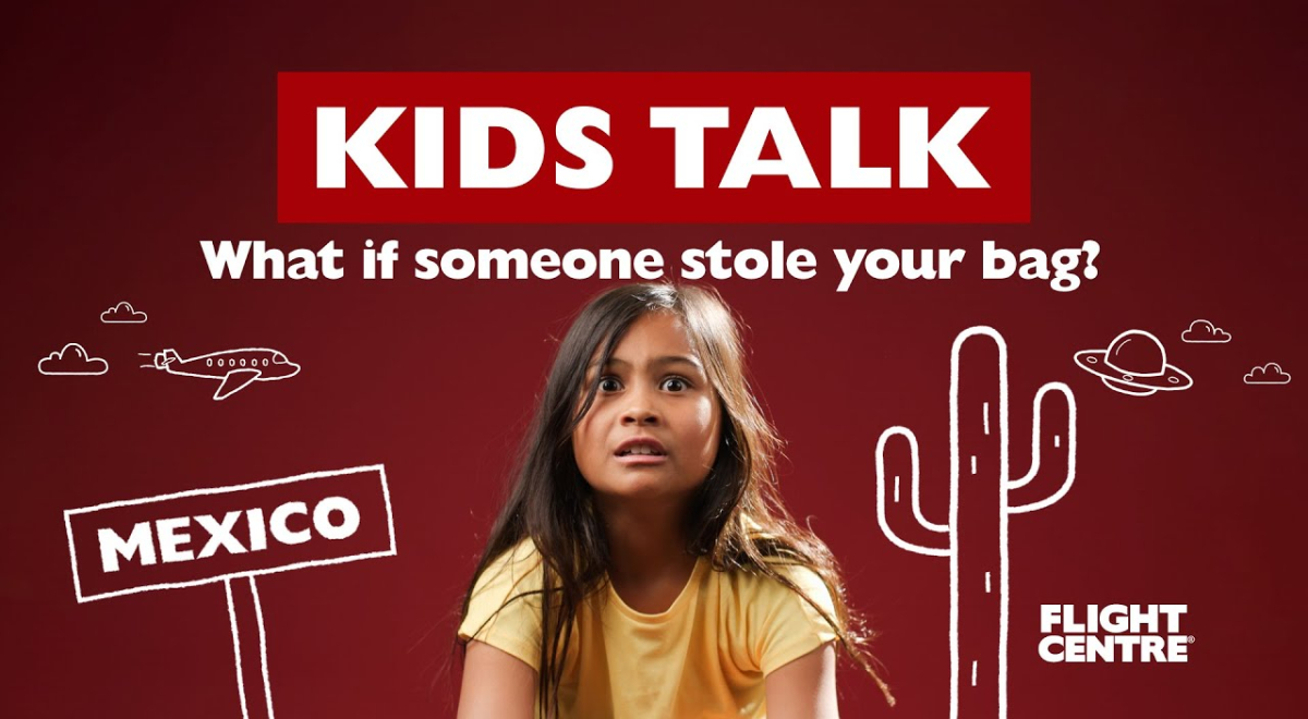 female sitting next to graphics of a Mexico sign and cactus.