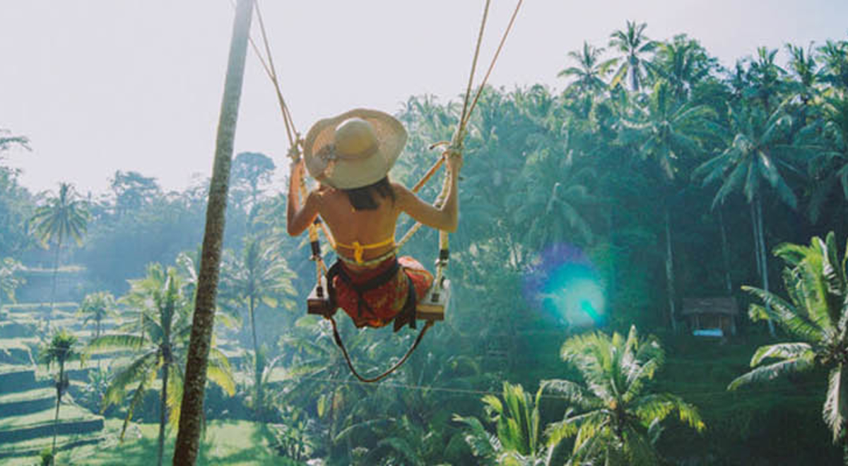 A person on a swing in Bali