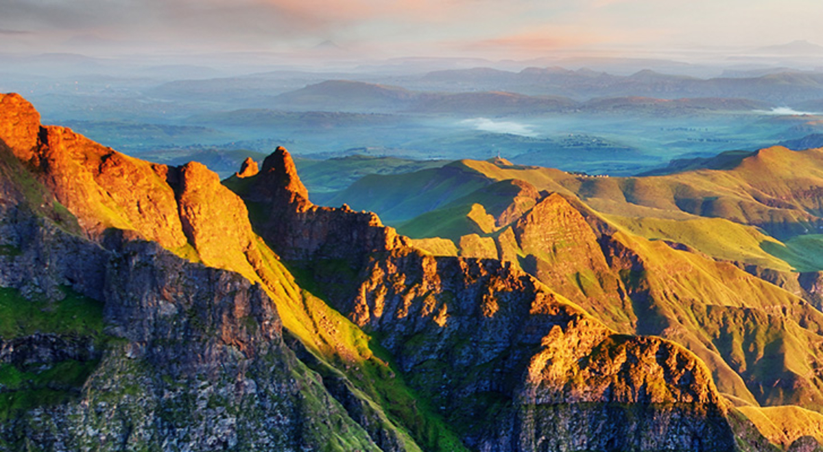 Cloud covered mountains during a cold sunrise