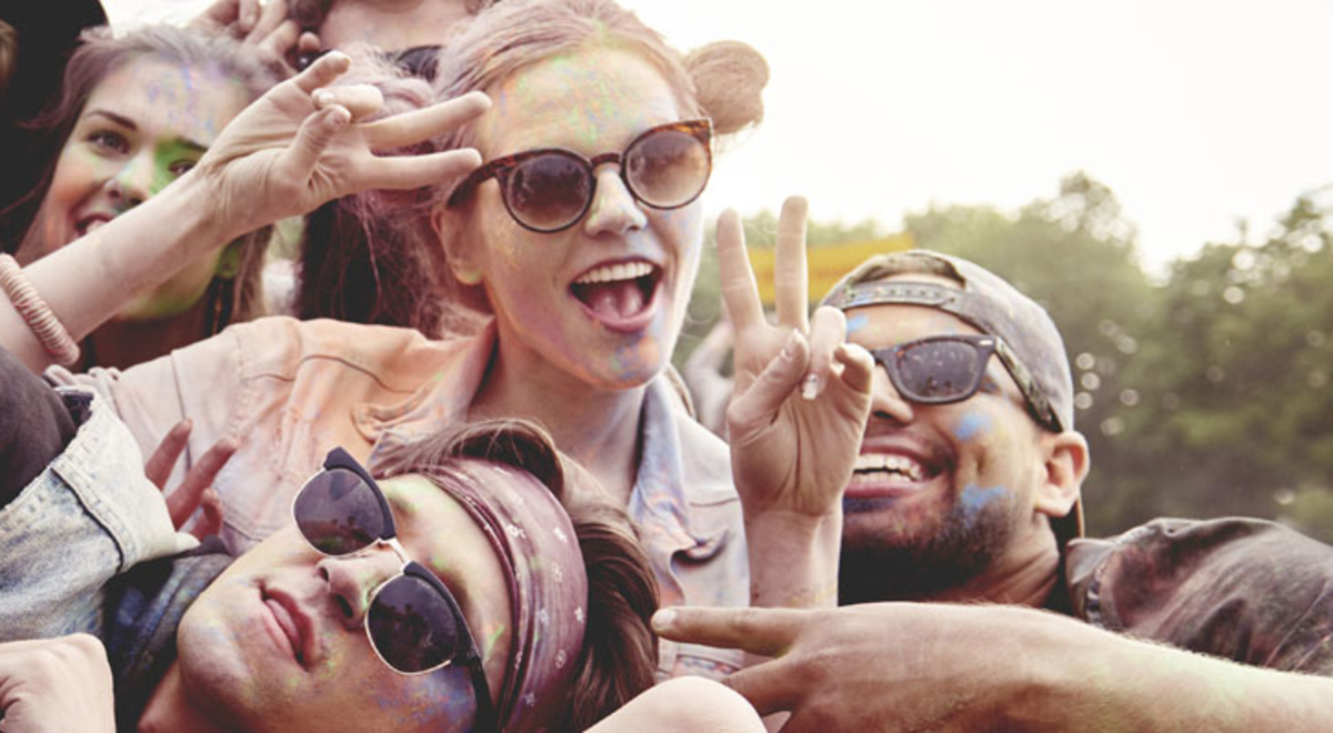Group of friends partying at a festival