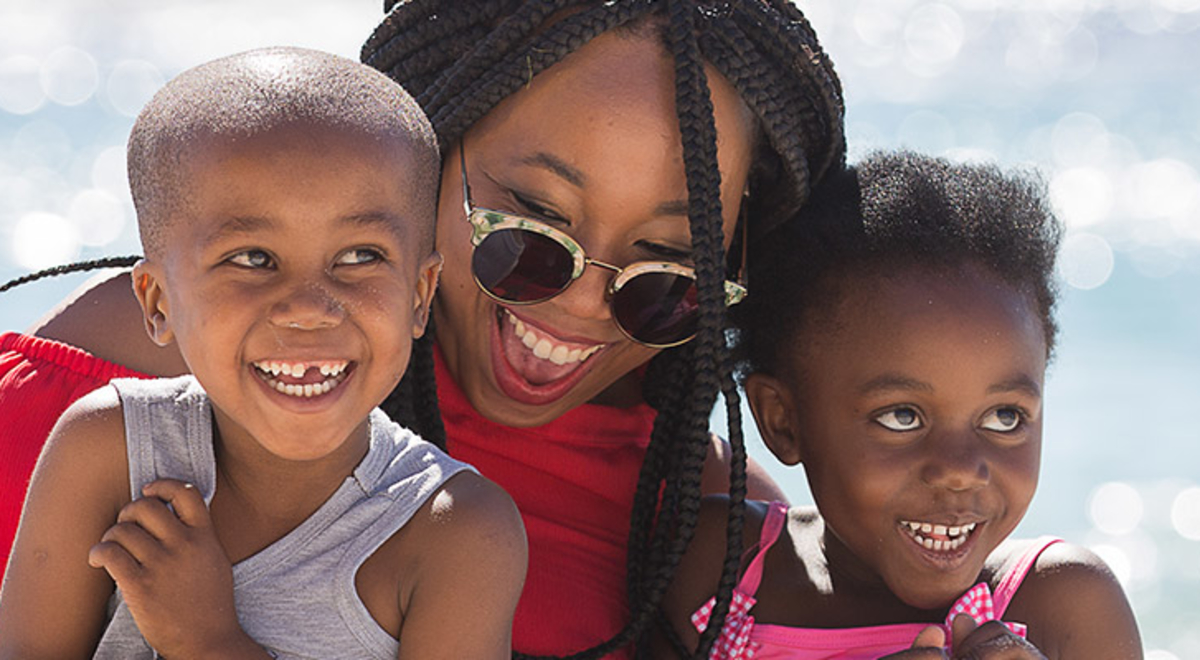 Mother laughing with her two children