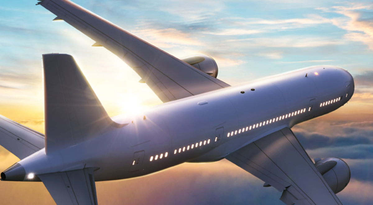 Commercial airline flying above the clouds