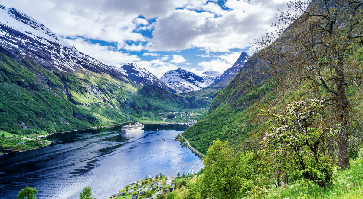 A cruise sailing in a Norwegian fjord
