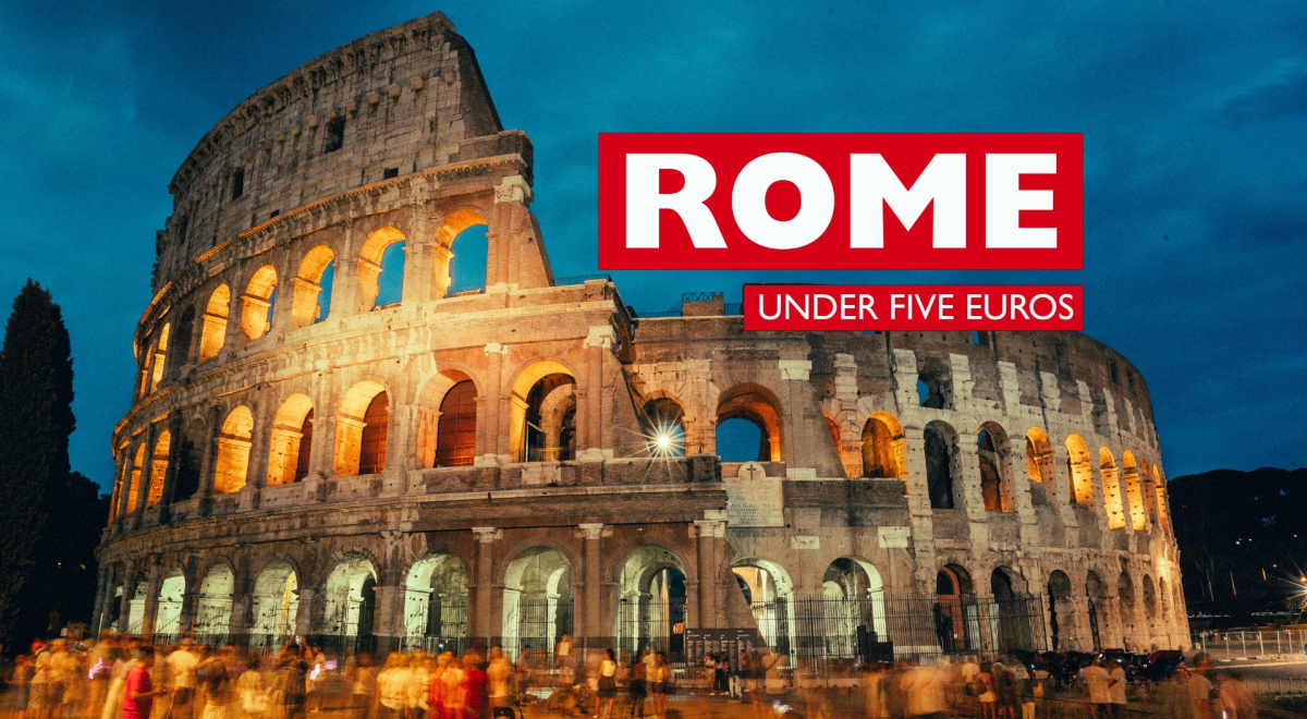 The Colosseum in Rome lit up at night with dark clouds above it. The text 'Rome under five Euros' is on the image.