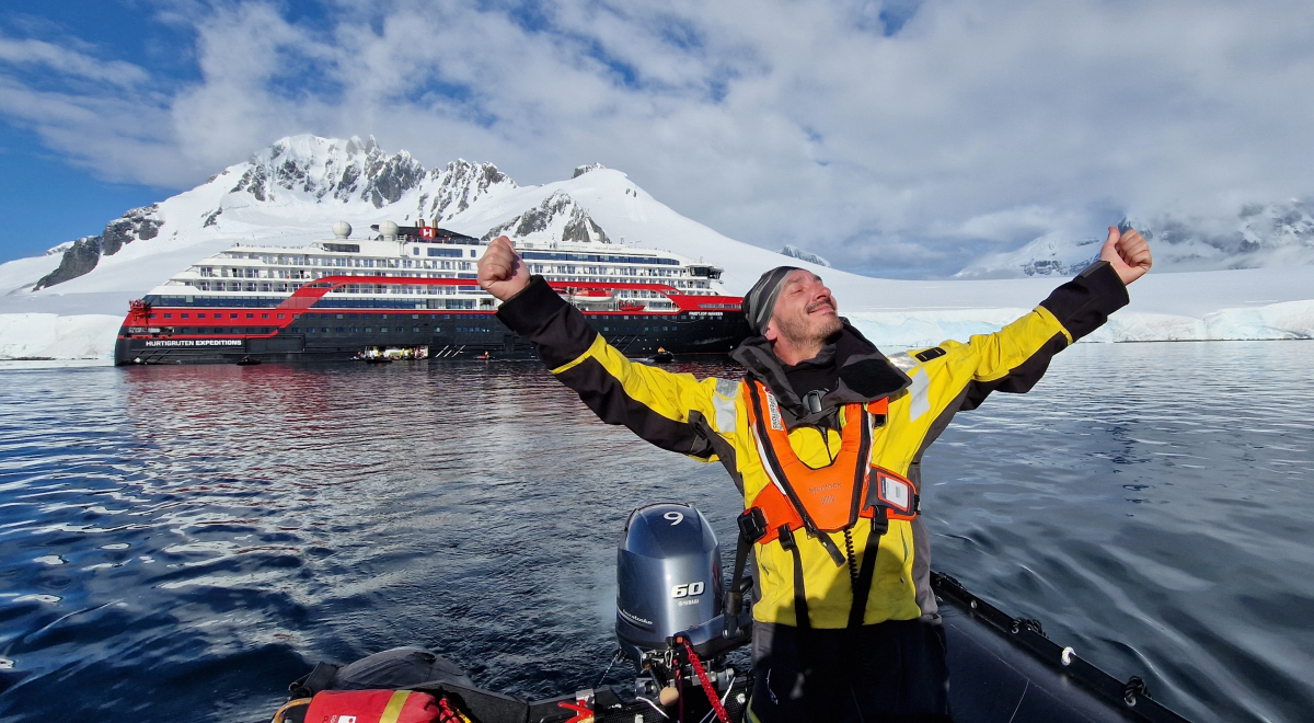 Torstein in Antarctica with ship