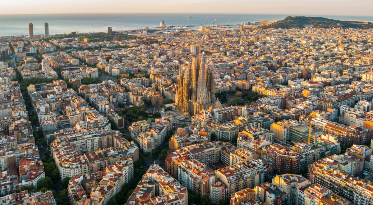 Aerial view of Barcelona with La Sagrada Familia standing tall in the centre of the city