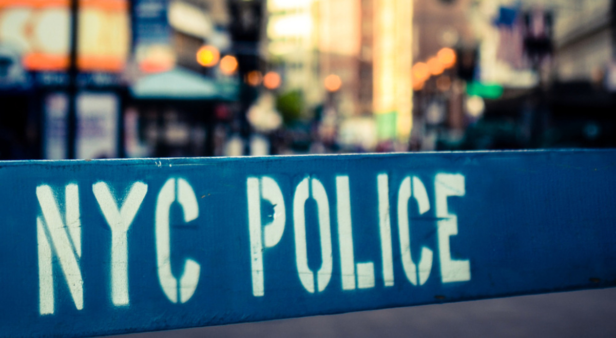 Blue New York City Police road barrier