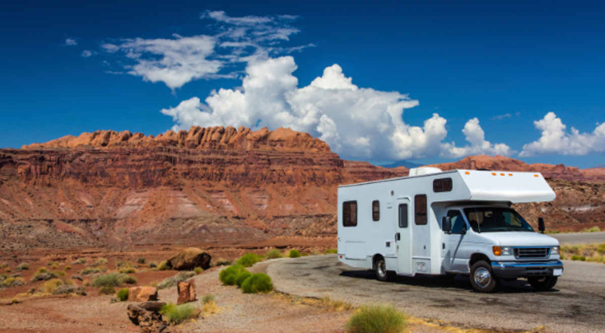 RV in the road with the view of the canyon