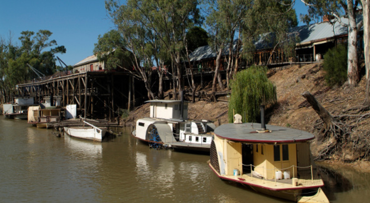 boats line up the Echuca Moama in Murray River