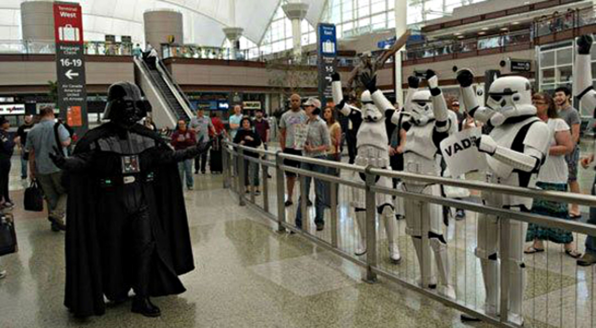 Darth Vada and storm trooper dress up in the airport 