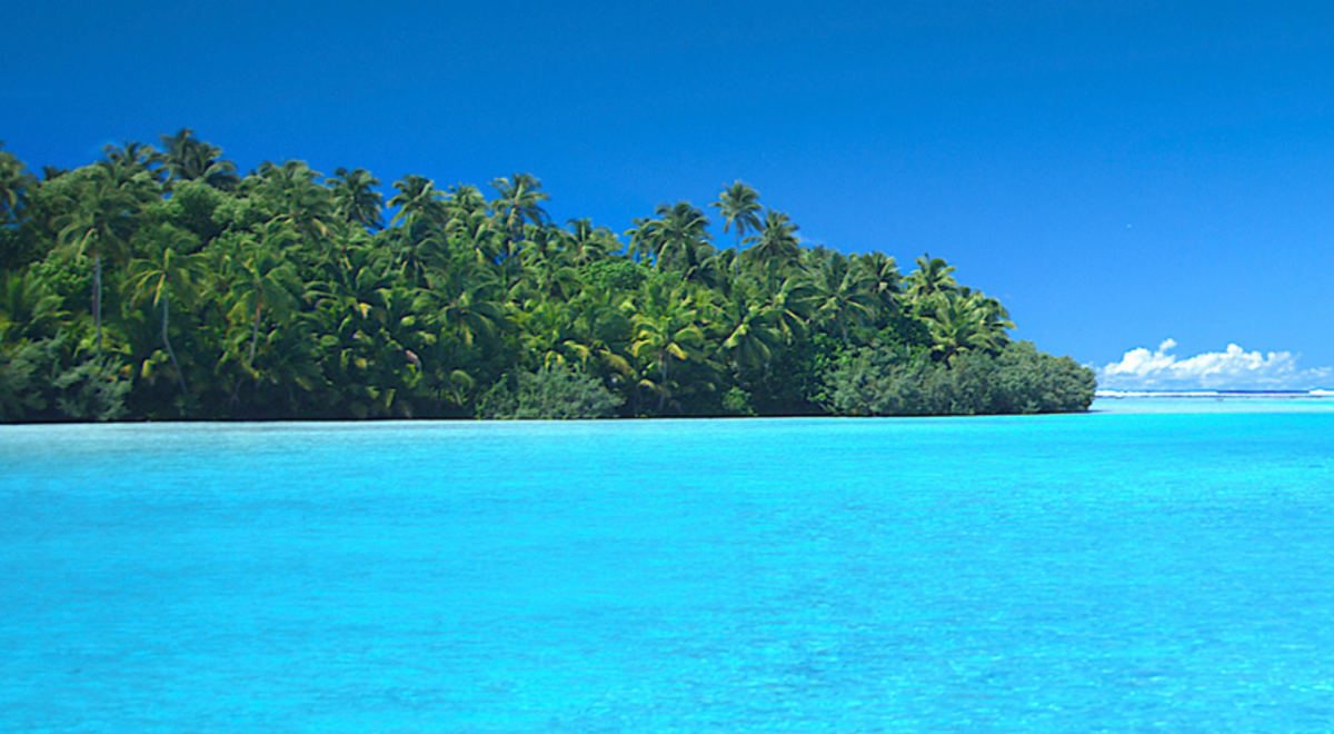 Beautiful Island of Aitutaki showcasing their forest and blue sea. 