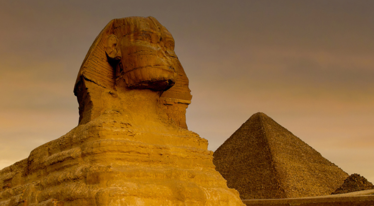 The Great Sphinx and Giza Pyramids in the twilight