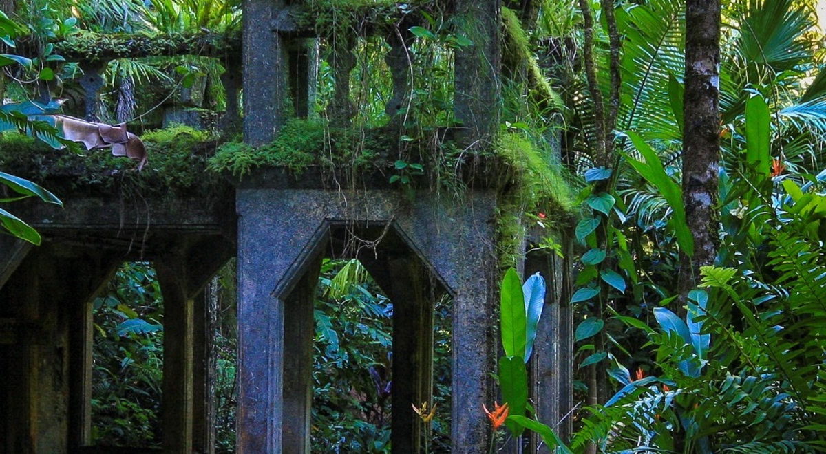 Overgrown ruins in rainforest setting of Paronella Park in Queensland