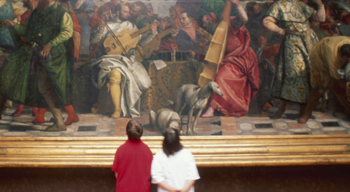 Children in museum viewing a painting 