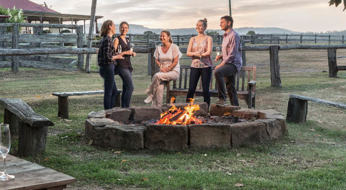 group around fire pit spicers hidden vale