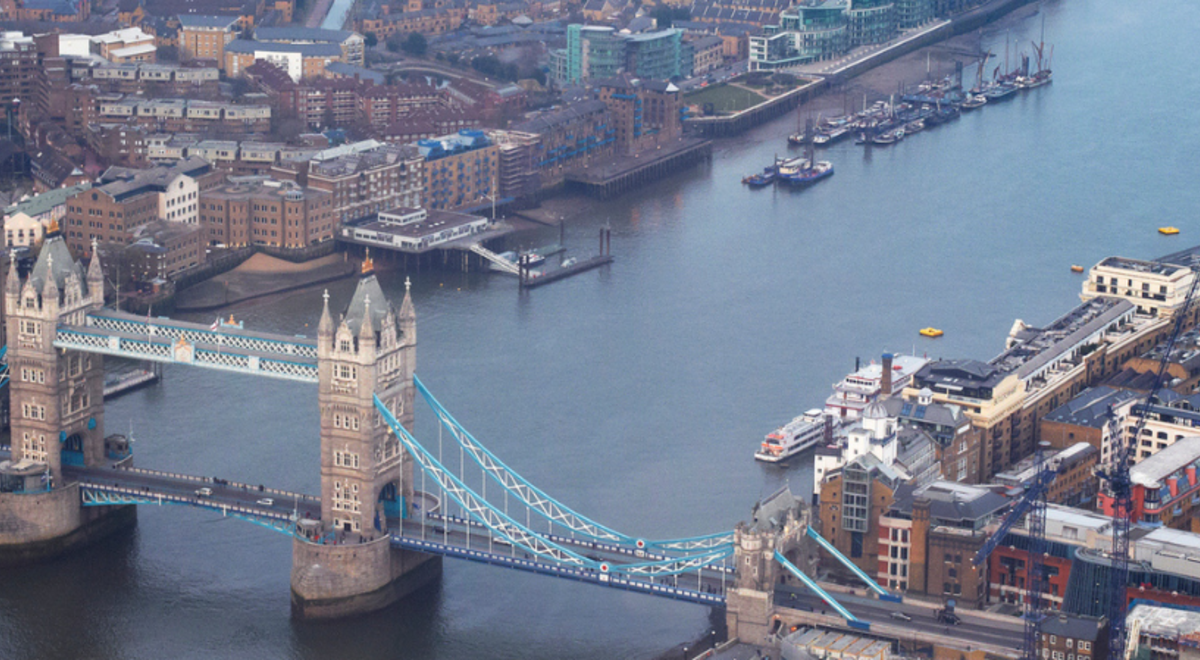 aerial view of the london tower bridge and the two cities it connects