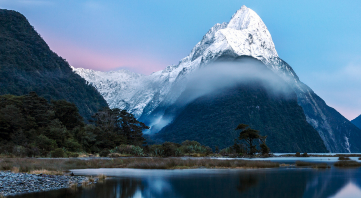 lake with icy mountains on the background