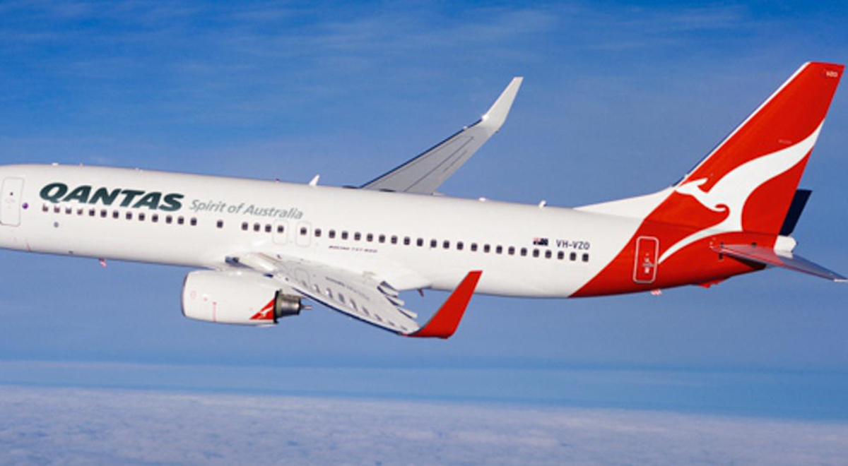 Qantas' airplane soaring through the sky