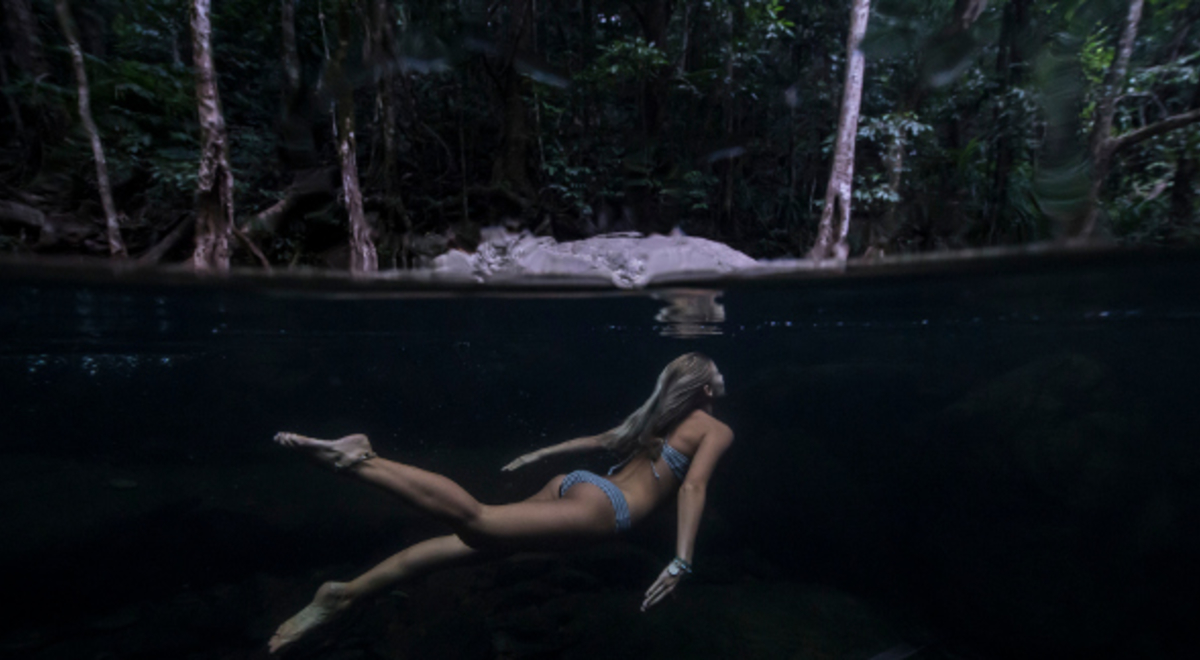 Woman in a bikini underwater 