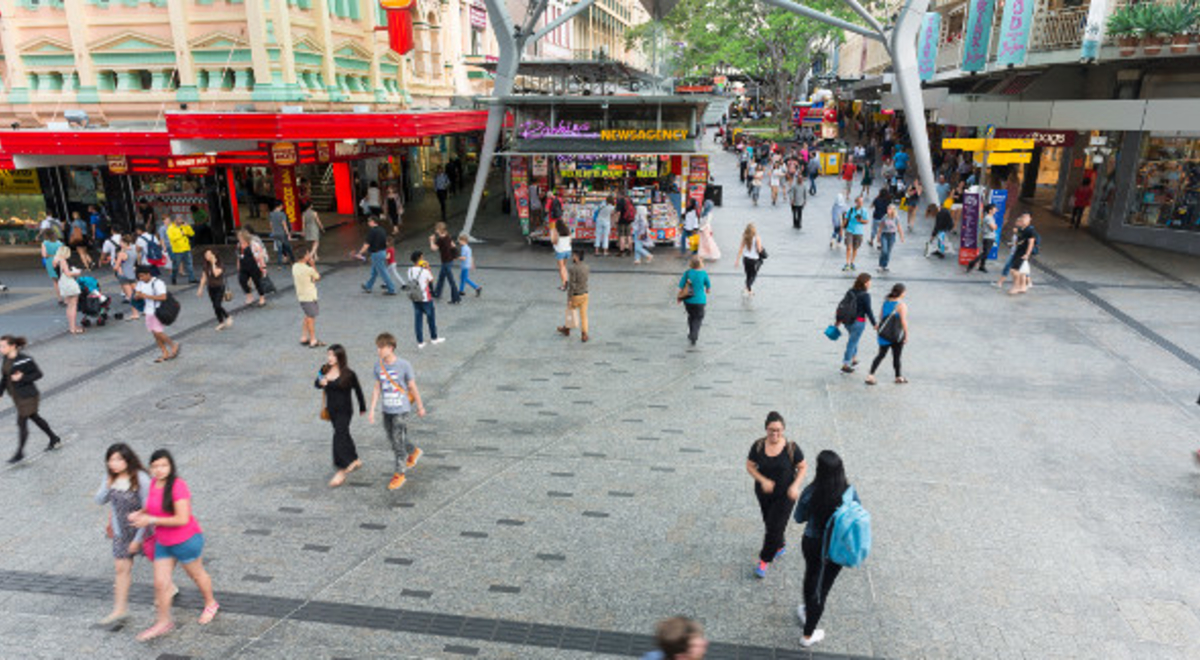 A crowd walking through the Queen Street Mall in Brisbane