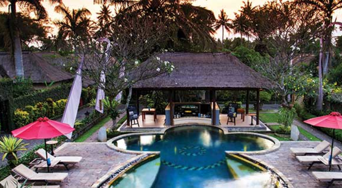 View of the pool and surrounding landscape at  the Ubud Furama villa Bali