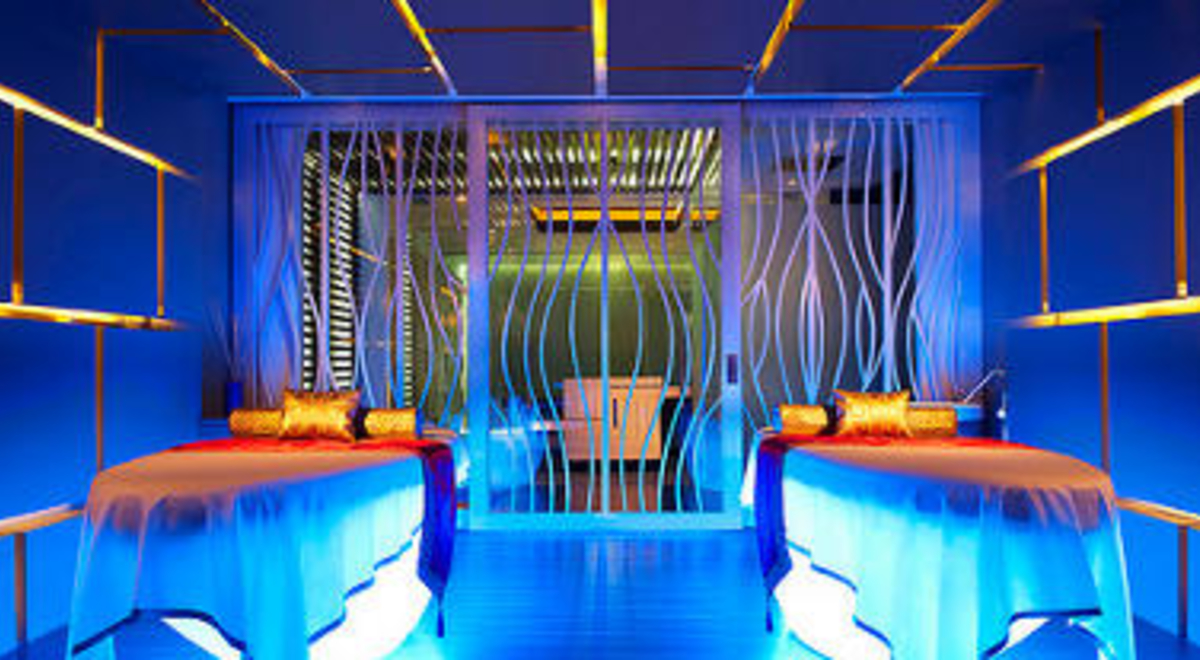 The inside of the day spa with blue lighting 