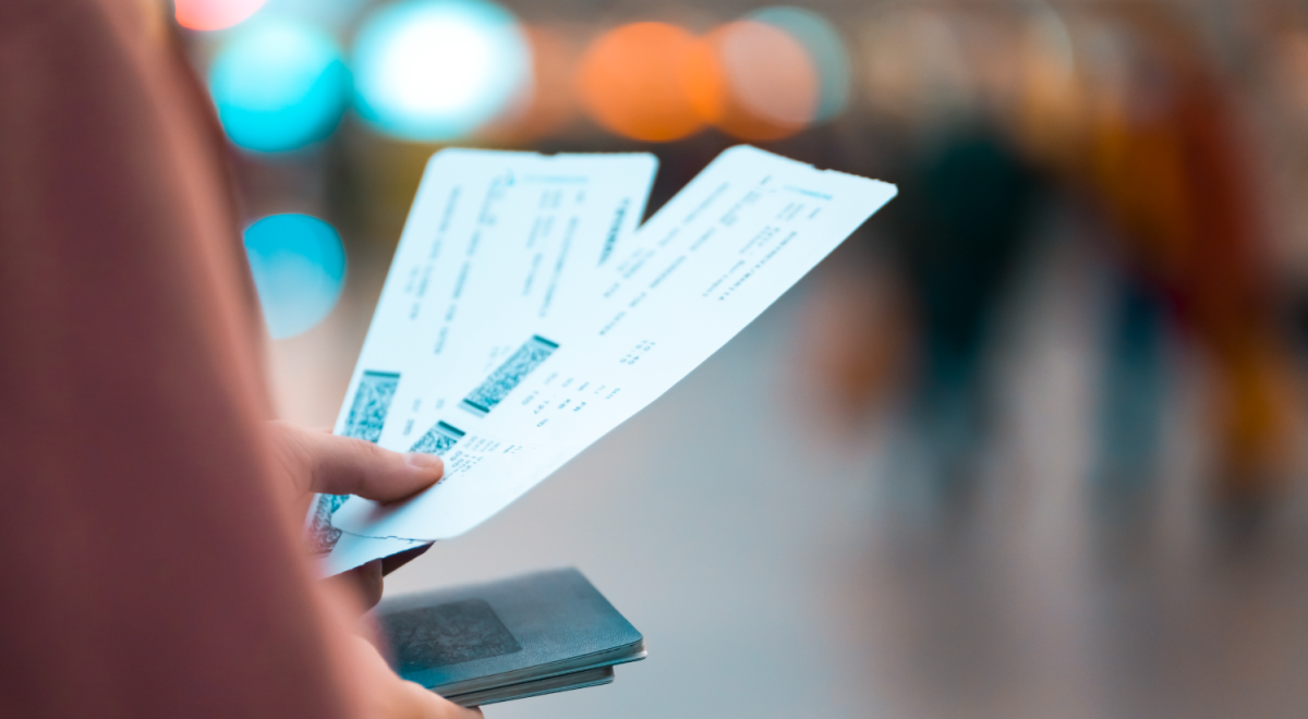 Traveller holding multiple airline tickets