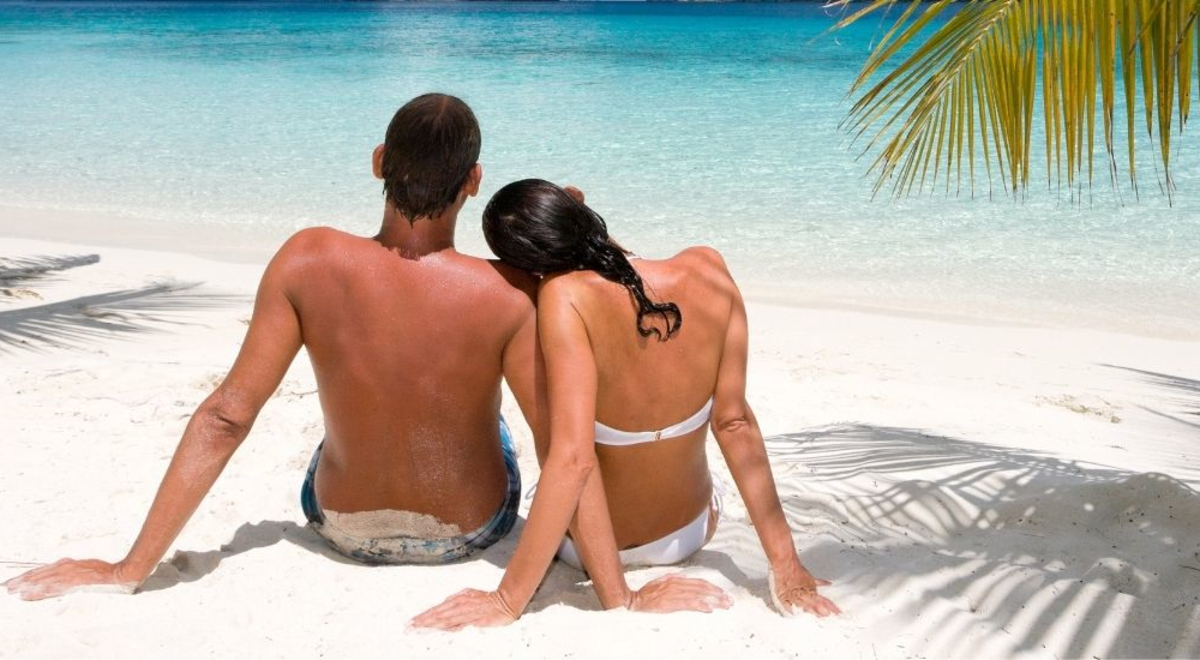 Couple on sandy beach