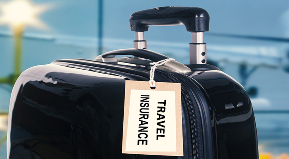 A black suitcase with a tag labelled 'travel insurance' and a plane taking off in the background