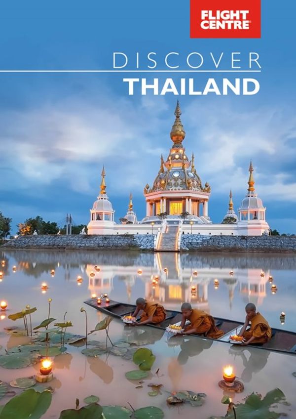 Flight Centre - Discover Thailand. Children placing flowers in the water in front of a temple in Thailand