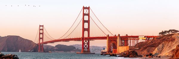 golden gate bridge at sunset over water san francisco
