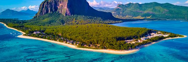 Island surrounded by clear water