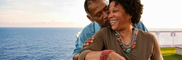 Couple looking over balcony