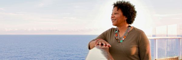 Lady looking over balcony
