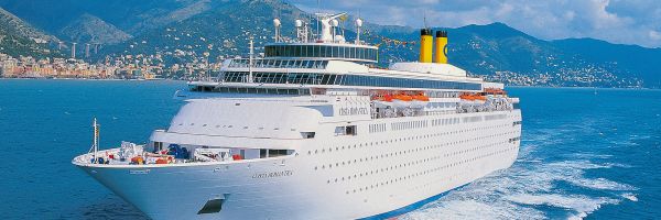 Cruise ship with mountains in background