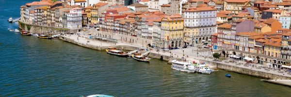 River ship travelling through European city