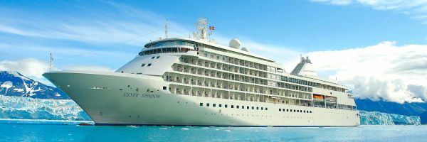 Silversea Cruise ship sailing past icy sheets