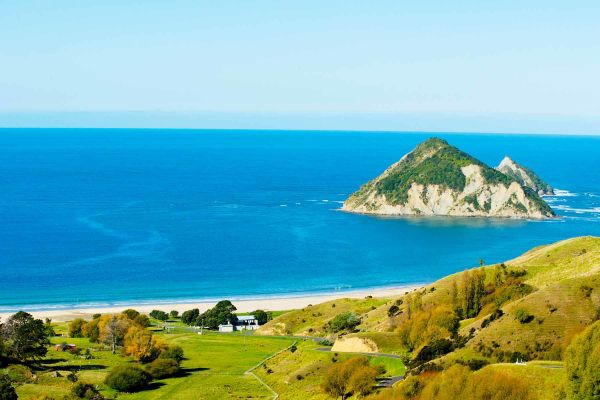 Grassy hills overlooking water