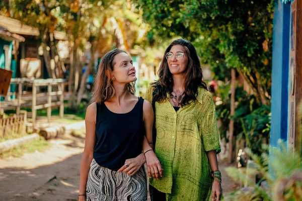 Young women exploring a beach town in Bahia