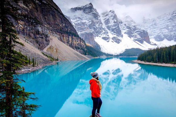 Family looking over Lake Moraine, Banff National Park, Canada 