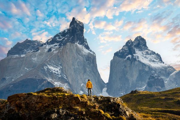Hiker admiring the Cuernos del Paine range, Patagonia