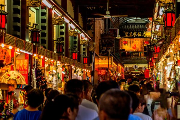 Busy Chinese shopping street at night