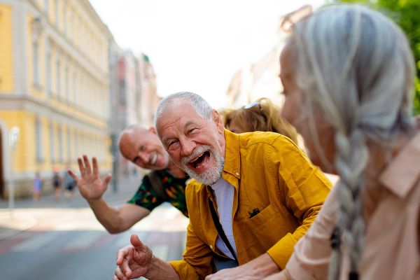 Three people laughing