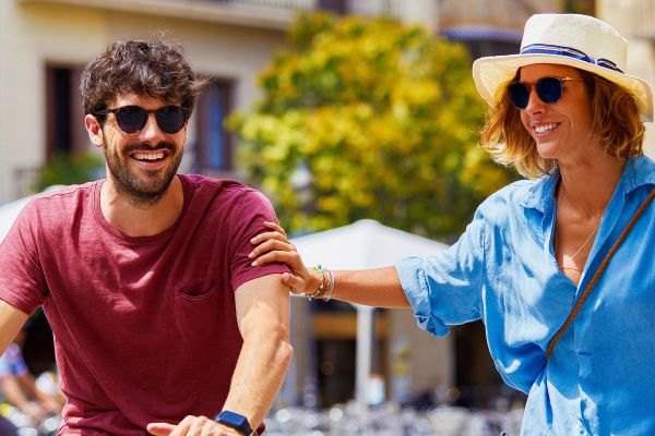 Two people riding bikes through Europe
